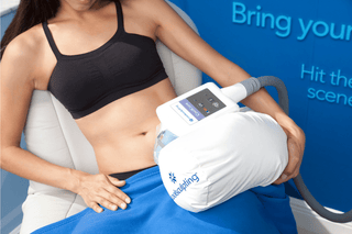 Woman receiving body sculpting treatment