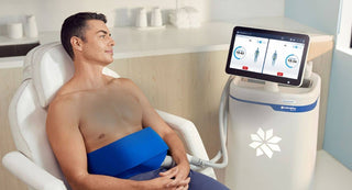 Man receiving body sculpting treatment