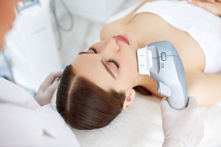 Woman receiving facial treatment at Leor Clinic