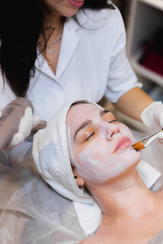 Woman receiving facial treatment at Leor Clinic