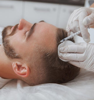 Man receiving hair transplant