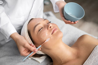 Woman receiving face massage