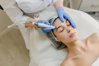 Woman receiving skincare treatment at Leor Clinic