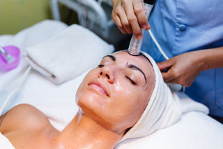 Woman receiving laser treatment at Leor Clinic
